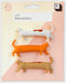 Cat-shaped erasers in packaging with 'good design' label