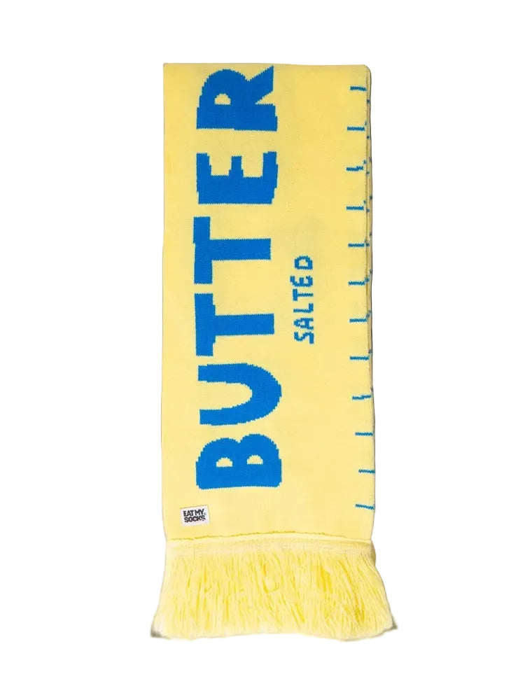Yellow scarf with blue text on a white background