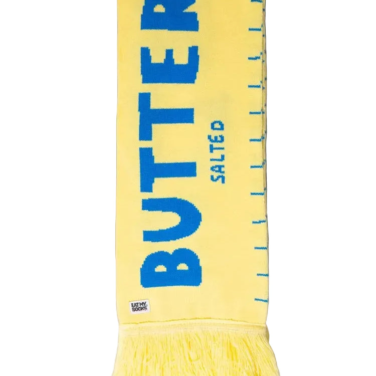 Yellow scarf with blue text on a white background