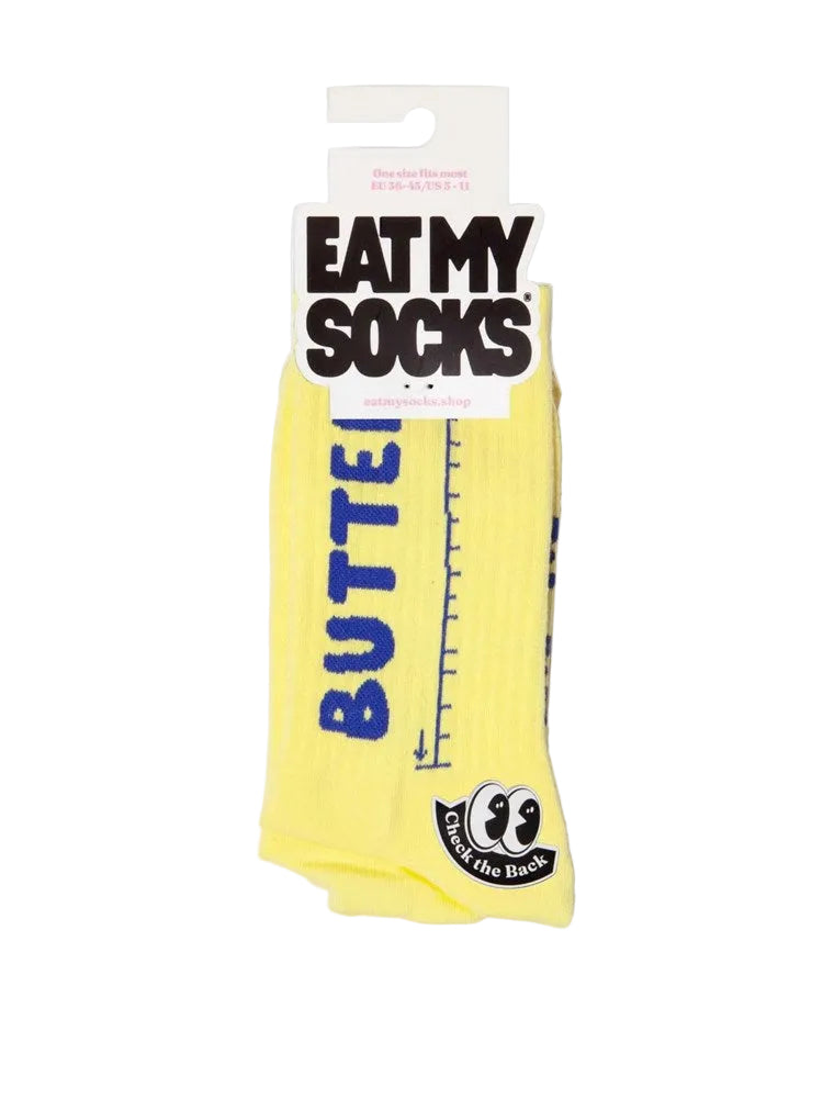 Yellow sock with 'Butter' text and 'Eat My Socks' packaging on a white background