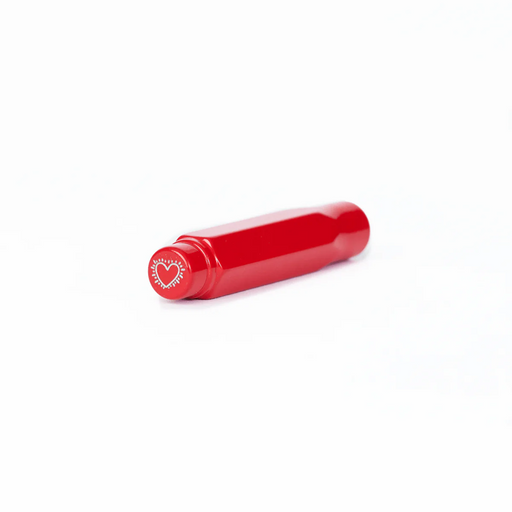Red cylindrical object with a heart-shaped logo on a white background