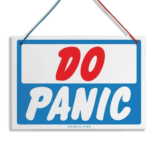 Hanging sign with 'DO PANIC' text on a white background