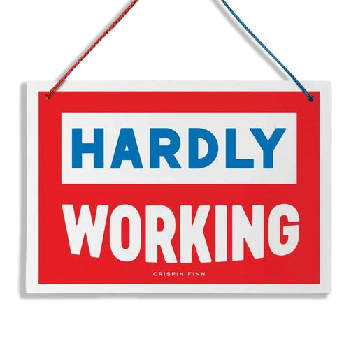 Red sign with blue and white text on a white background