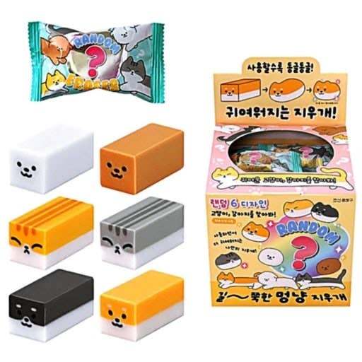 Set of cute animal-themed erasers with packaging on a white background