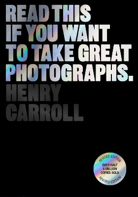 This image features the cover of the book "Read This if You Want to Take Great Photographs" revised edition, by Henry Carroll. The cover design is striking with a bold, black background and white text that gives a modern, clean look.